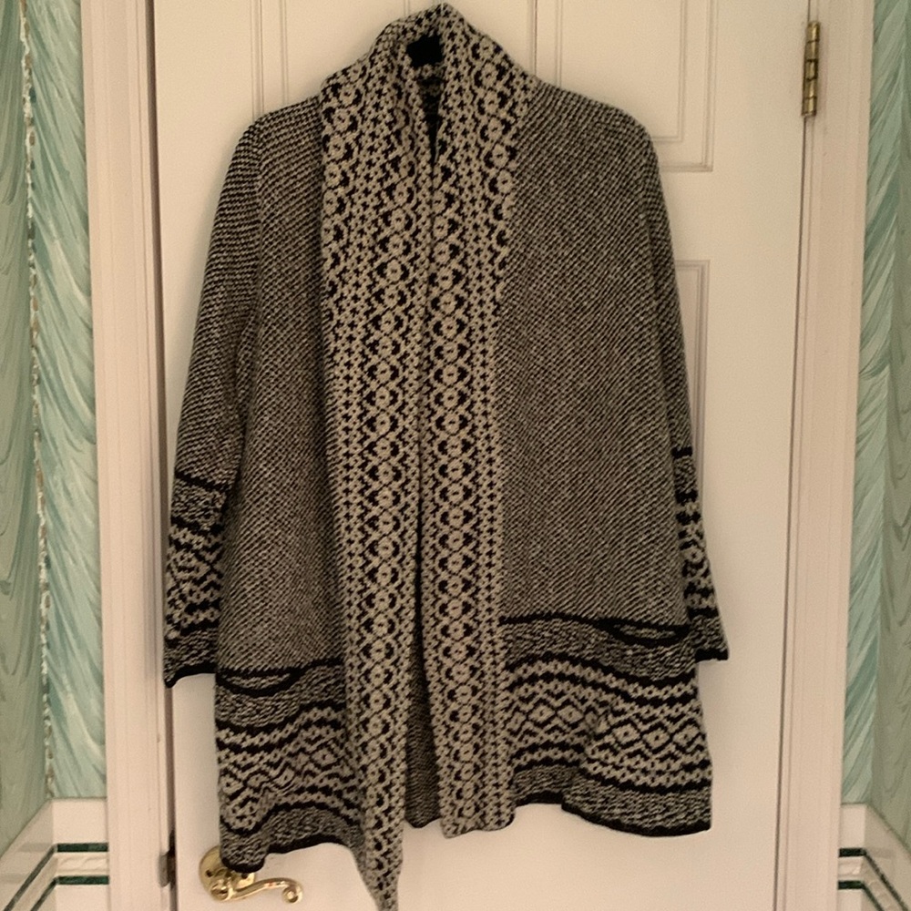 Long coat style sweater.